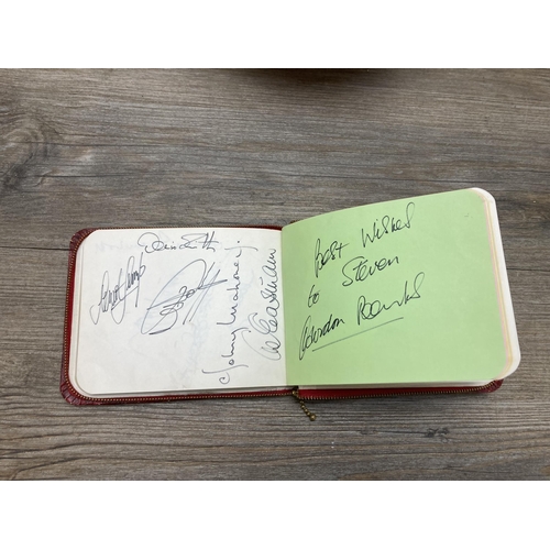 511 - A signed Stoke City Football Club football and autograph album to include signatures by Gordon Banks... 