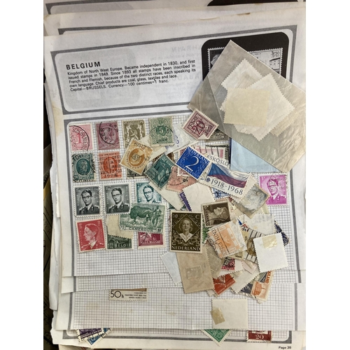 519 - A box containing a large collection of worldwide stamps and first day covers