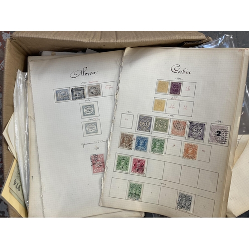 519 - A box containing a large collection of worldwide stamps and first day covers