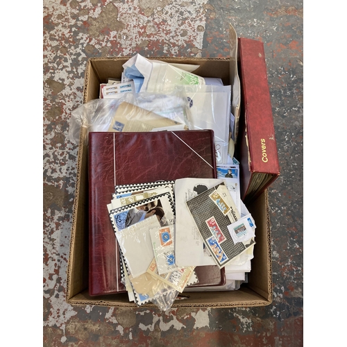 520 - A box containing a large collection of worldwide stamps and first day covers