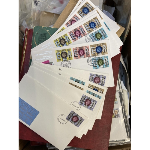 520 - A box containing a large collection of worldwide stamps and first day covers