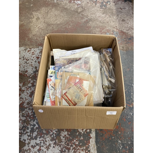 522 - A box containing a large collection of worldwide stamps and first day covers