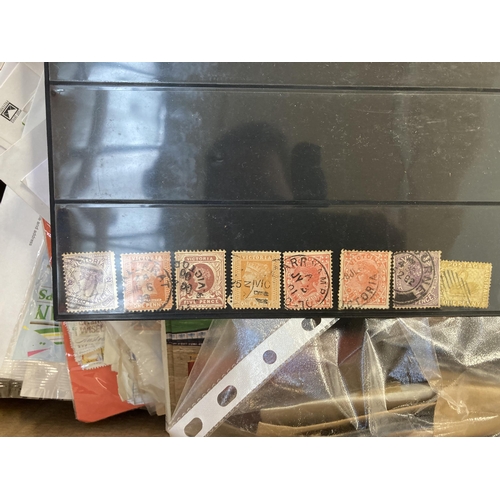 522 - A box containing a large collection of worldwide stamps and first day covers