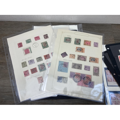 523 - A collection of worldwide stamps to include New Zealand imperforate proof stamps, South African stam... 