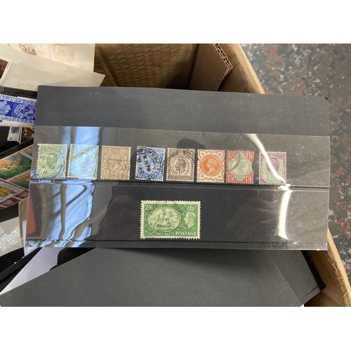 526 - A box containing a large collection of worldwide stamps and first day covers