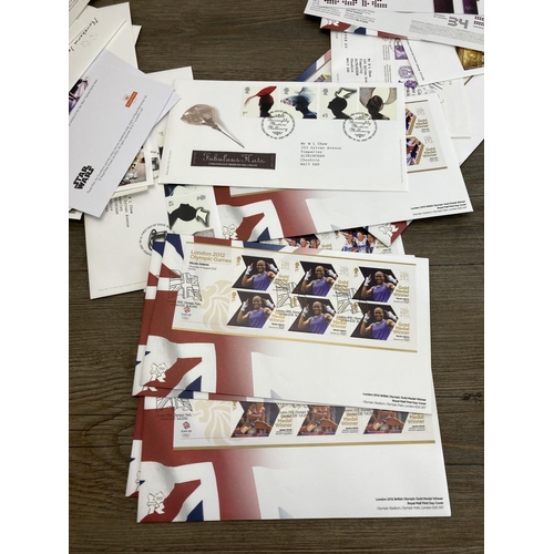 531 - A collection of British stamps and first day covers to include Trafalgar, London 2012 Olympic games,... 