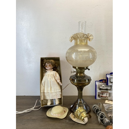 547 - Various collectables to include Victorian style brass electric oil lamp, boxed diecast model vehicle... 