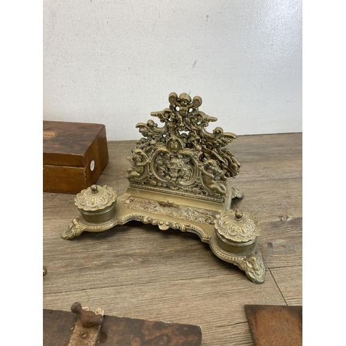 554 - Various collectables to include Victorian brass inkwell and letter rack stand, 19th century cast bra... 