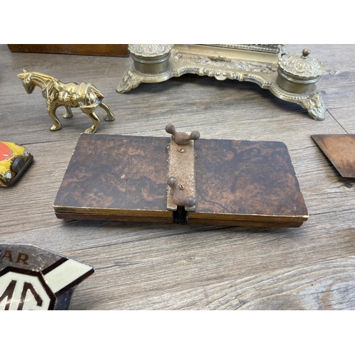 554 - Various collectables to include Victorian brass inkwell and letter rack stand, 19th century cast bra... 