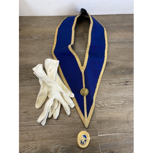 555 - A collection of masonic regalia to include Josiah Wedgwood Lodge jewels, sashes, books, presentation... 