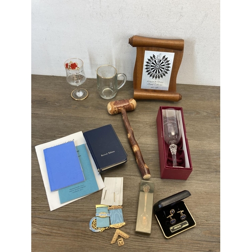 555 - A collection of masonic regalia to include Josiah Wedgwood Lodge jewels, sashes, books, presentation... 