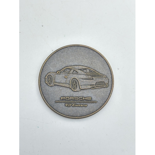 2256 - A boxed Porsche 911 Carrera S limited edition model/ paperweight with medallion