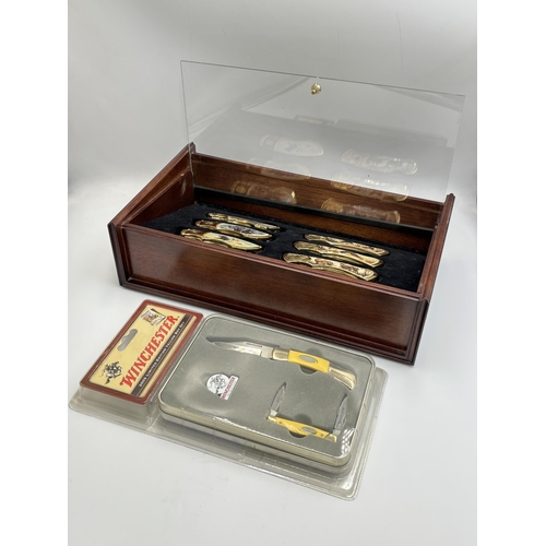 2257 - A wooden cased set of six Franklin Mint collector's knives together with a boxed Winchester 2005 lim... 