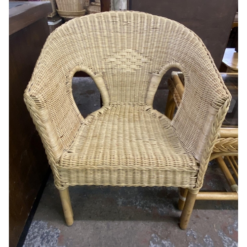 105 - Four pieces of wicker and cane furniture, two glass top coffee tables and two armchairs