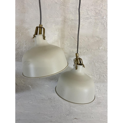 106 - Three IKEA white metal pendant light shades - largest approx. 38cm diameter