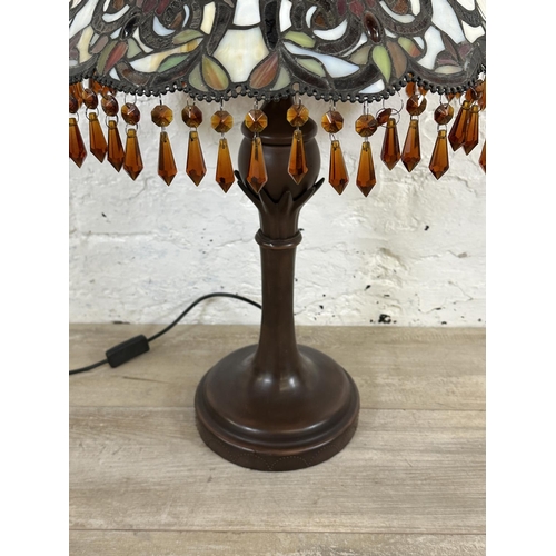 11 - A Kind Light Manufacturing Ltd Tiffany style table lamp on bronzed effect base - approx. 70cm high