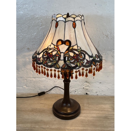 11 - A Kind Light Manufacturing Ltd Tiffany style table lamp on bronzed effect base - approx. 70cm high