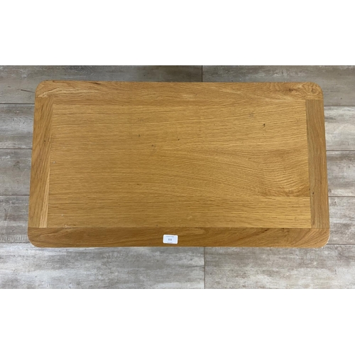 111 - A contemporary oak coffee table - approx. 43cm high x 45cm wide x 80cm long