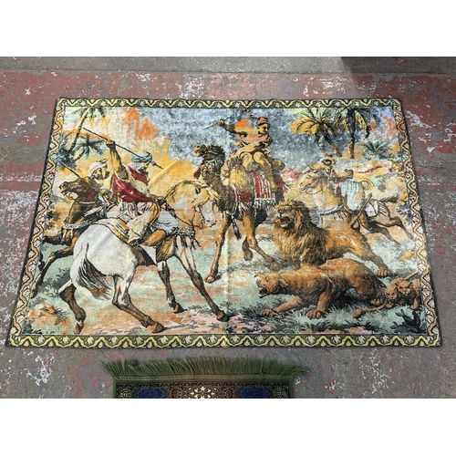 13 - Two woven items, one wall hanging depicting lion hunt - approx. 115cm high x 167cm and one velvet pr... 