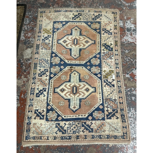 14 - A Persian style machine woven rug - approx. 150cm x 98cm