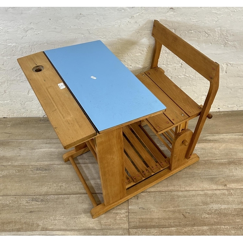 15 - A mid 20th century beech and blue laminate child's school desk - approx. 70cm high x 60cm wide x 80c... 