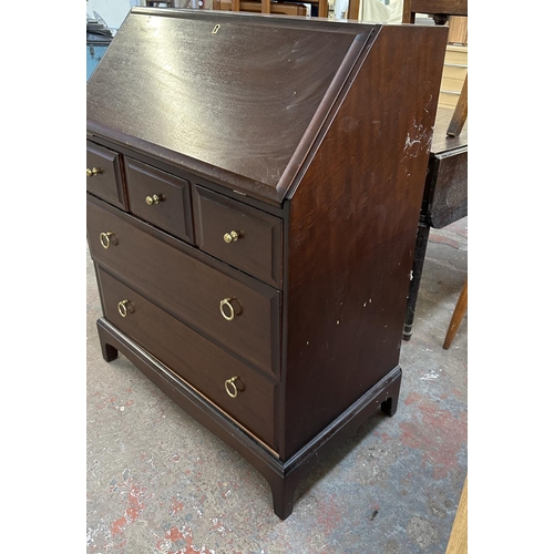 174 - A Stag Minstrel mahogany bureau - approx. 98cm high x 75cm wide x 44cm deep