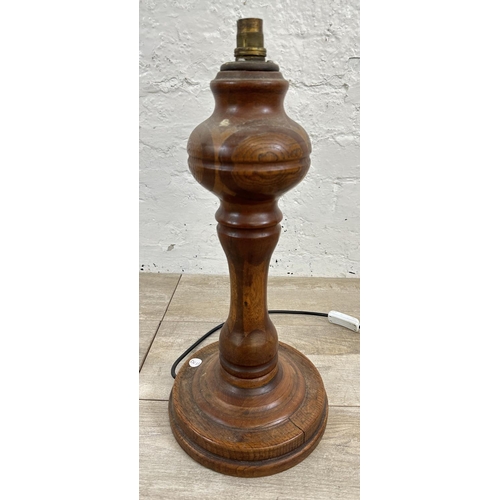 177 - A mid 20th century inlaid oak table lamp on circular base - approx. 80cm high including shade