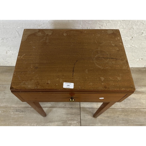 179 - A mid 20th century teak bedside table - approx. 66cm high x 46cm wide x 31cm deep