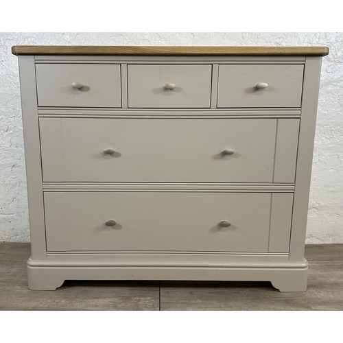 182 - A contemporary oak and grey painted chest of drawers - approx. 91cm high x 110cm wide x 45cm deep