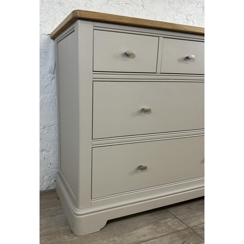 182 - A contemporary oak and grey painted chest of drawers - approx. 91cm high x 110cm wide x 45cm deep