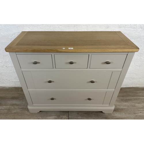 182 - A contemporary oak and grey painted chest of drawers - approx. 91cm high x 110cm wide x 45cm deep