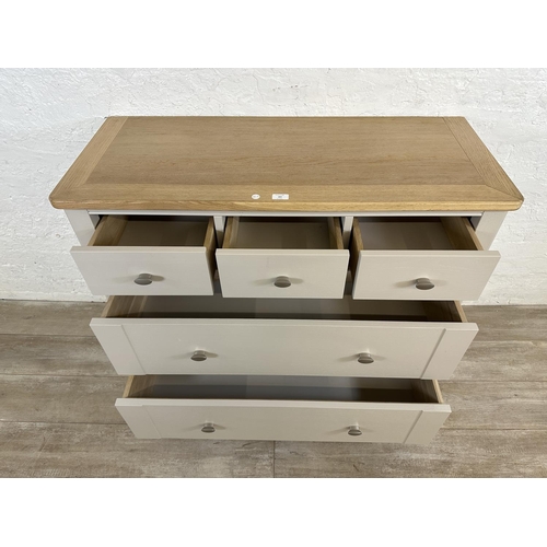 182 - A contemporary oak and grey painted chest of drawers - approx. 91cm high x 110cm wide x 45cm deep