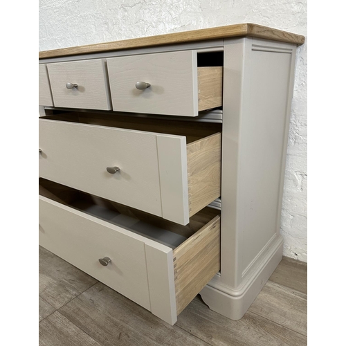 182 - A contemporary oak and grey painted chest of drawers - approx. 91cm high x 110cm wide x 45cm deep