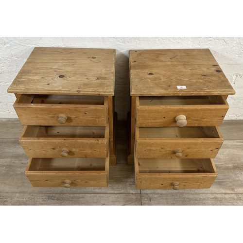 183 - A pair of pine bedside chests of drawers - approx. 59cm high x 46cm wide x 40cm deep