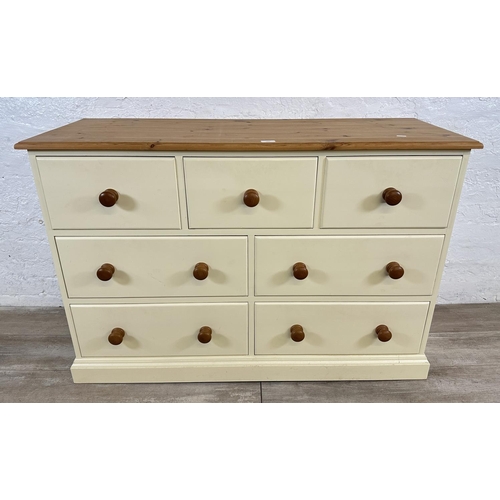 185 - A modern pine and cream painted chest of drawers - approx. 82cm high x 122cm wide x 45cm deep