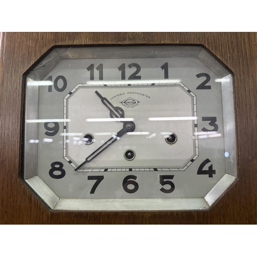 20 - An Art Deco Girod Veritable Westminster oak cased chiming wall clock with pendulum and key - approx.... 