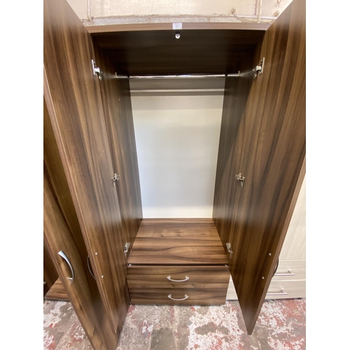 29 - Two contemporary walnut effect double wardrobes - approx. 188cm high x 80cm wide x 57cm deep