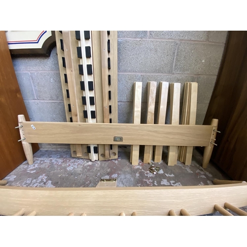 30 - A contemporary oak king size bed frame