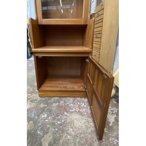 32 - A mid 20th century Nathan teak display cabinet - approx. 194cm high x 52cm wide x 45cm deep