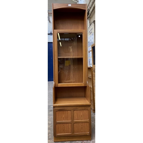 32 - A mid 20th century Nathan teak display cabinet - approx. 194cm high x 52cm wide x 45cm deep