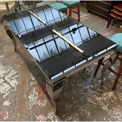 37 - A contemporary aluminium and black glass dining table - approx. 76cm high x 90cm wide x 160cm long