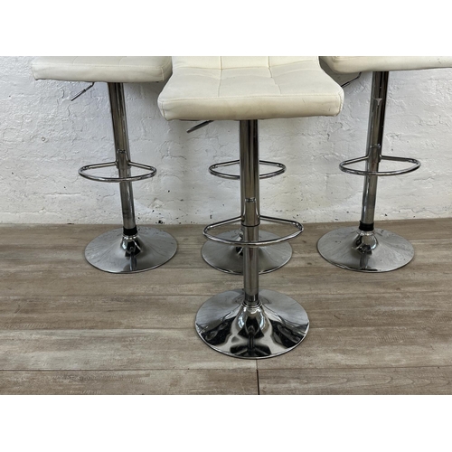 38 - Four contemporary white leatherette and chrome plated kitchen bar stools