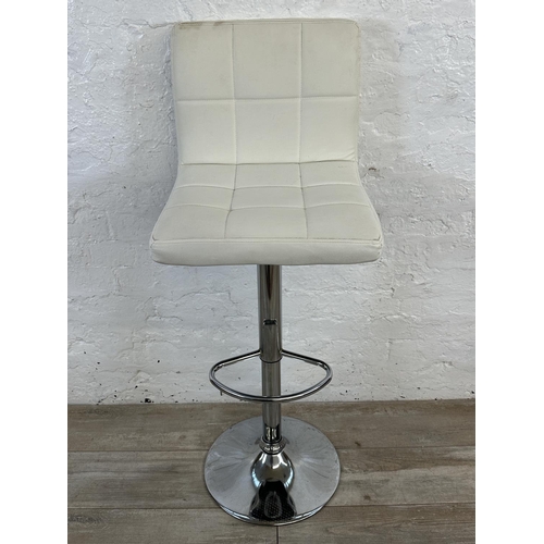 38 - Four contemporary white leatherette and chrome plated kitchen bar stools