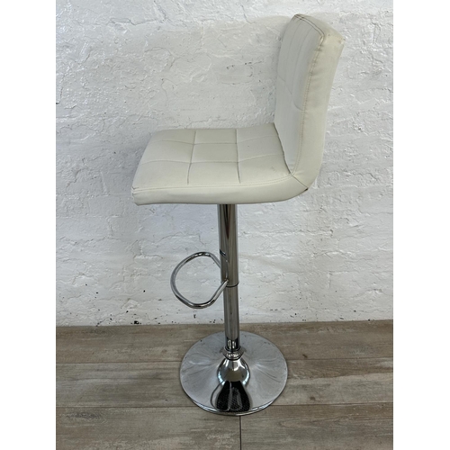 38 - Four contemporary white leatherette and chrome plated kitchen bar stools