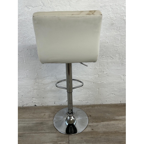 38 - Four contemporary white leatherette and chrome plated kitchen bar stools