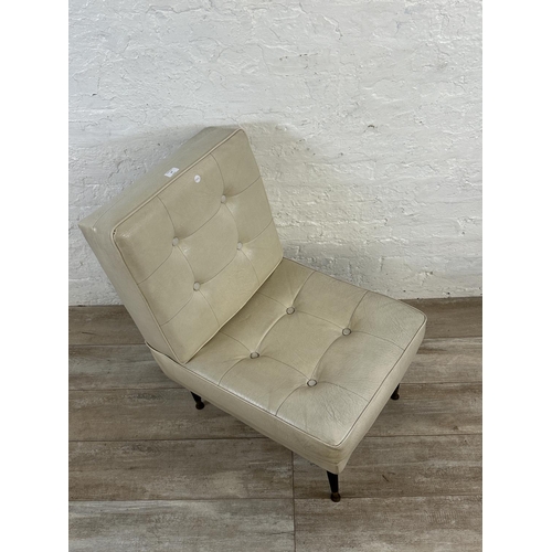 39 - A mid 20th century cream vinyl upholstered lounge chair on dansette legs - approx. 84cm high x 53cm ... 