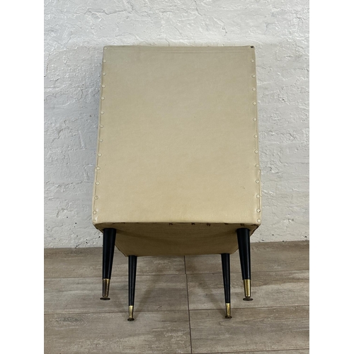 39 - A mid 20th century cream vinyl upholstered lounge chair on dansette legs - approx. 84cm high x 53cm ... 