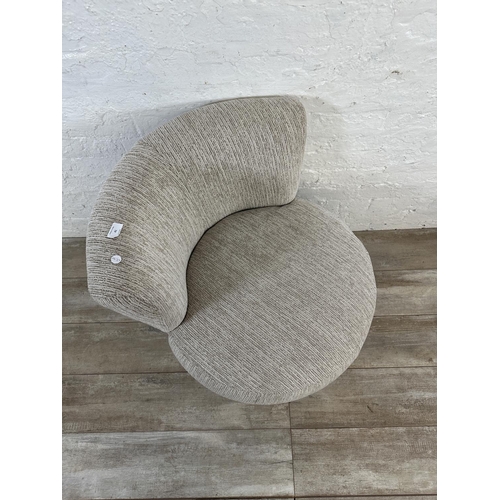 41 - A contemporary beige fabric upholstered accent chair - approx. 70cm high x 70cm wide x 56cm deep