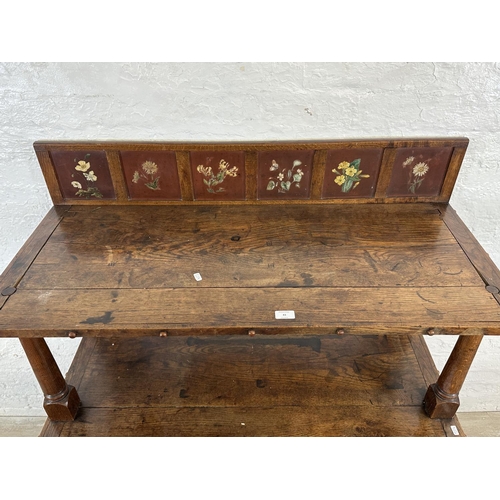 43 - A 19th century oak buffet with hand painted floral design back - approx. 126cm high x 110cm wide x 4... 