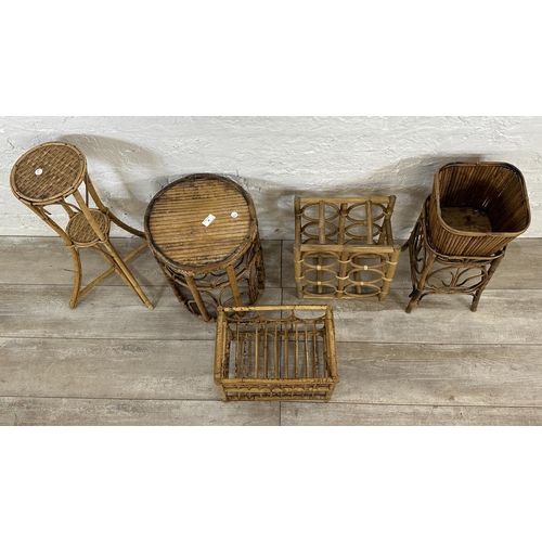 46 - Five pieces of wicker and bamboo furniture, one bottle rack, one magazine rack, one circular side ta... 